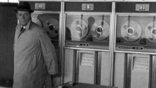 Godard pits a noir detective against a proto-HAL